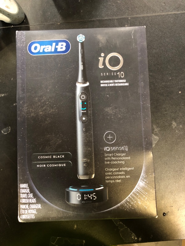 Photo 1 of Oral-B iO Series 10 Rechargeable Electric Toothbrush with Visible Pressure Sensor to Protect Gums, 2 Min Timer, 7 Cleaning Settings, 4 Replacement Toothbrush Heads, and Charging Travel Case, Black