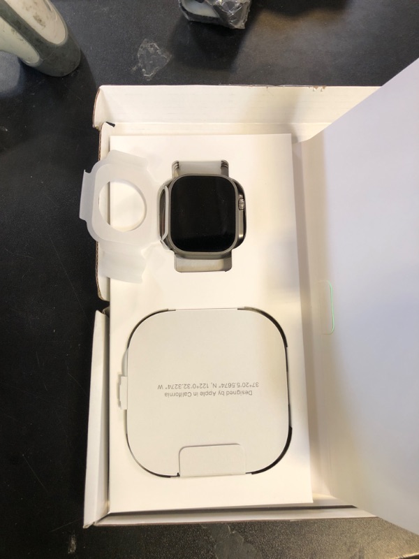 Photo 1 of Apple Watch Ultra [GPS + Cellular 49mm] Titanium Case with Midnight Ocean Band, One Size (Renewed Premium)