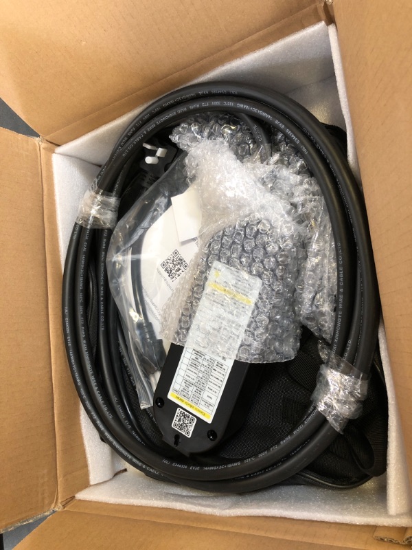 Photo 1 of Level 1 & Level 2 EV Charger 16Amp 110-240V,17ft Cable, Portable Electric Vehicle Charger with NEMA5-15P & 6-20 Plug Compatible for SEA J1772 EV Cars for Home and Outdoor (Black)