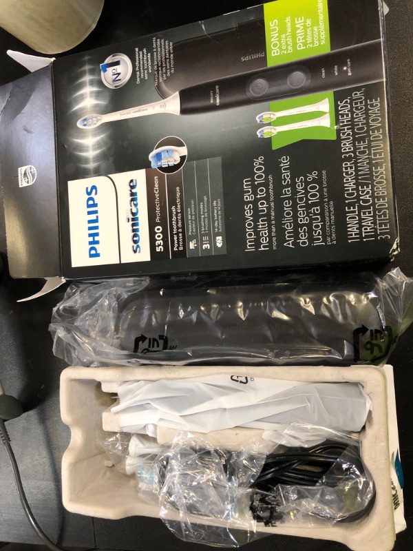 Photo 1 of Philips Sonicare ProtectiveClean 5300 Rechargeable Electric Toothbrush, with Pressure Sensor, 3 Cleaning Modes, SmarTimer and QuadPacer, with 2 Bonus Brush Heads, Travel Case, Black, Model HX6423/34