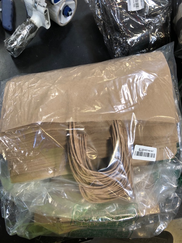 Photo 1 of 57 Lb Large Kraft Paper Grocery Bags with Handles - 50 Count 12 x 17 x 7 - Durable, Reusable & Eco-Friendly Shopping Bags, Brown Kraft Take-Out Bags for Retail, To-Go, Any Occasion (50, With Handles)