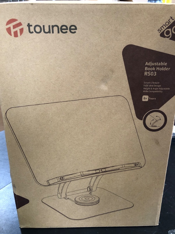 Photo 1 of Tounee Book Stand for Reading, Adjustable Book Holder with 360° Swivel Base, Foldable Cookbook Stand Recipe Book Holder with Elastic Page Clips for Music Scores, Recipe, Tablet, Laptop-Black