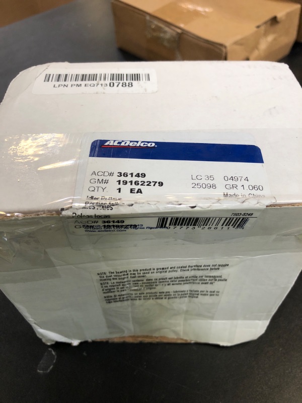 Photo 1 of ACDelco Gold 36149 Idler Pulley with Bracket, Washer, Nuts, and Bolts