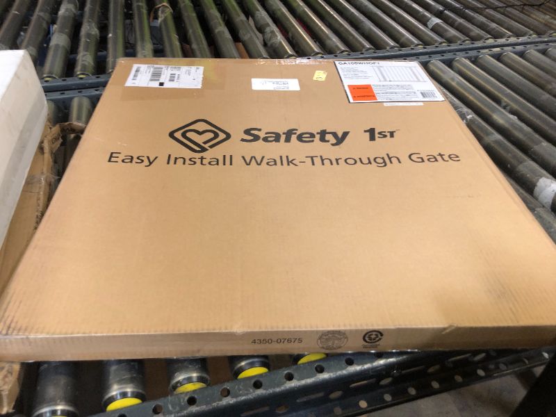 Photo 1 of Safety 1st Easy Install Walk Thru Baby Gate for Doorways, Gate With Door, Dog Gates, Fits 29"-38", Easy Install 28" Tall, White