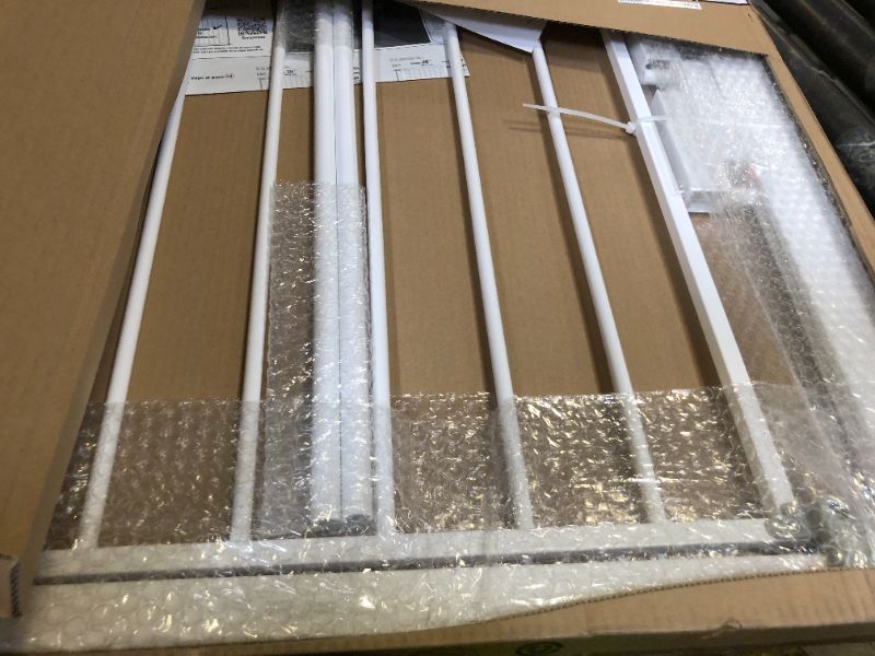 Photo 1 of Safety 1st Easy Install Walk Thru Baby Gate for Doorways, Gate With Door, Dog Gates, Fits 29"-38", Easy Install 28" Tall, White