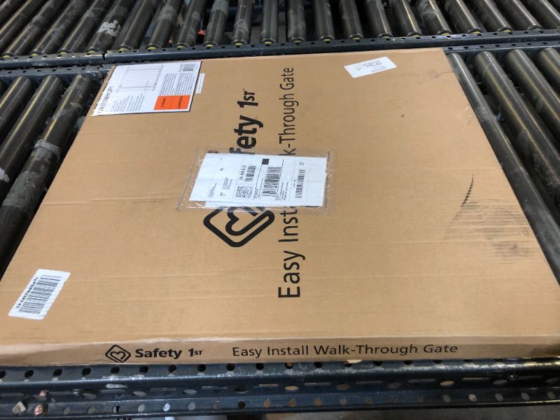 Photo 1 of Safety 1st Easy Install Walk Thru Baby Gate for Doorways, Gate With Door, Dog Gates, Fits 29"-38", Easy Install 28" Tall, White