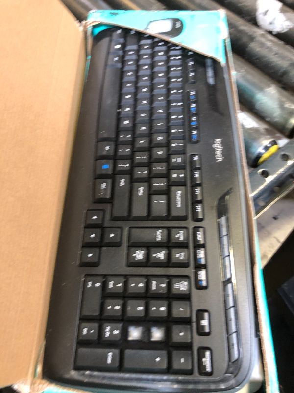 Photo 1 of Logitech MK335 Quiet Wireless Keyboard and Mouse Combo - Black/Silver Keyboard and Mouse Combo Wireless, Ambidextrous