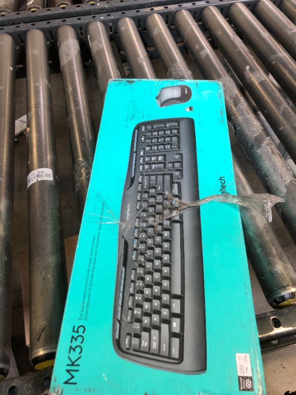 Photo 1 of Logitech MK335 Quiet Wireless Keyboard and Mouse Combo - Black/Silver Keyboard and Mouse Combo Wireless, Ambidextrous