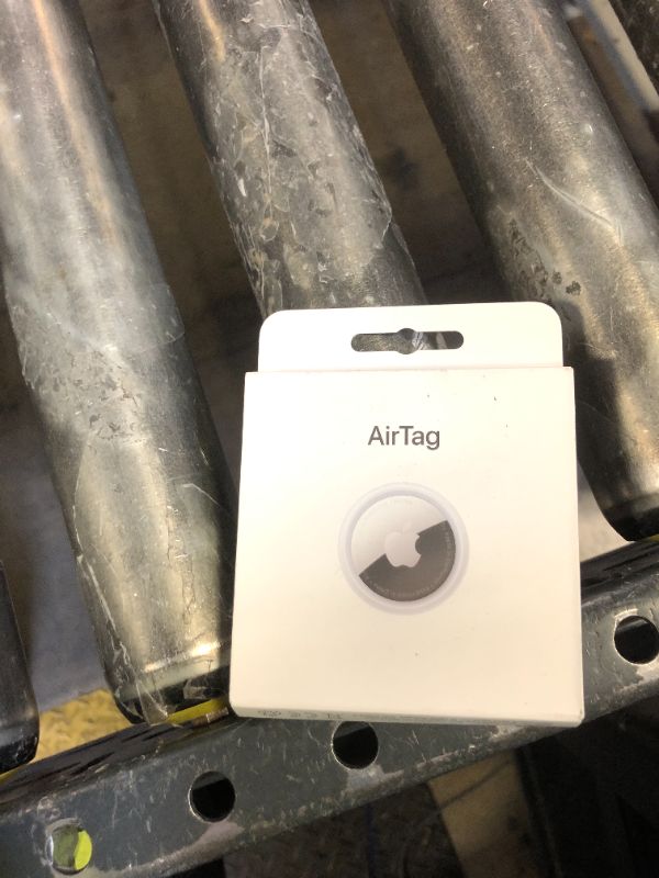 Photo 1 of Apple AirTag. Keep Track of and find Your Keys, Wallet, Luggage, Backpack, and More. Simple one-tap Set up with iPhone or iPad