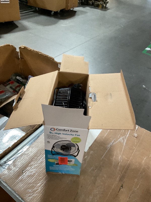Photo 1 of ***(MAJOR DAMAGE/ SEE NOTES)***
Comfort Zone 9 inch Cradle Fan, 3 Speed Floor or Table Fan with180 Degree Tilt, Metal Construction and Aluminum Blades, Carry Handle, Rubber Feet, Ideal for Bedroom, Workshop, or Garage, Black