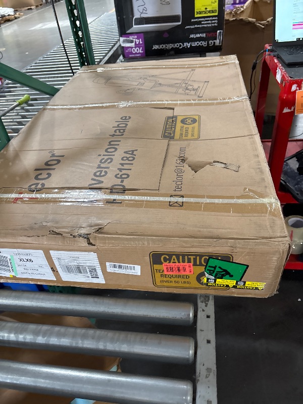 Photo 1 of Teclor Advanced Heat and Massage Strength Training Inversion Table for Back Pain Relief,Heavy Duty Inversion Table 350 lbs Capacity with Wider and Thickened Backrest, Orange/Black