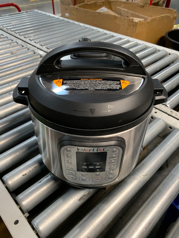 Photo 1 of (DENTED) (PARTS) (NOT A COMPLETE SET) Instant Pot Duo 7-in-1 Electric Pressure Cooker, Slow Cooker, Rice Cooker, Steamer, Sauté, Yogurt Maker, Warmer & Sterilizer, Includes App With Over 800 Recipes, Stainless Steel, 6 Quart