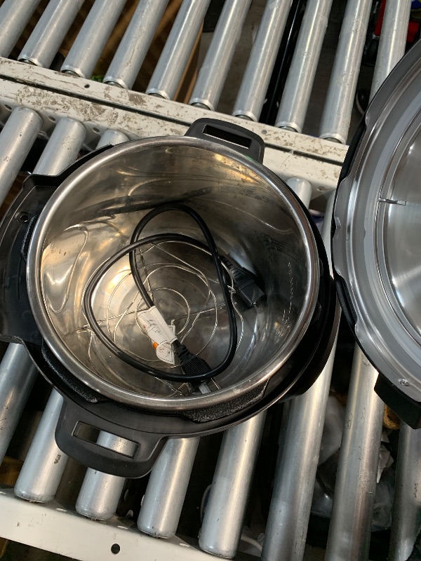 Photo 1 of (DENTED) (PARTS) (NOT A COMPLETE SET) Instant Pot Duo 7-in-1 Electric Pressure Cooker, Slow Cooker, Rice Cooker, Steamer, Sauté, Yogurt Maker, Warmer & Sterilizer, Includes App With Over 800 Recipes, Stainless Steel, 6 Quart