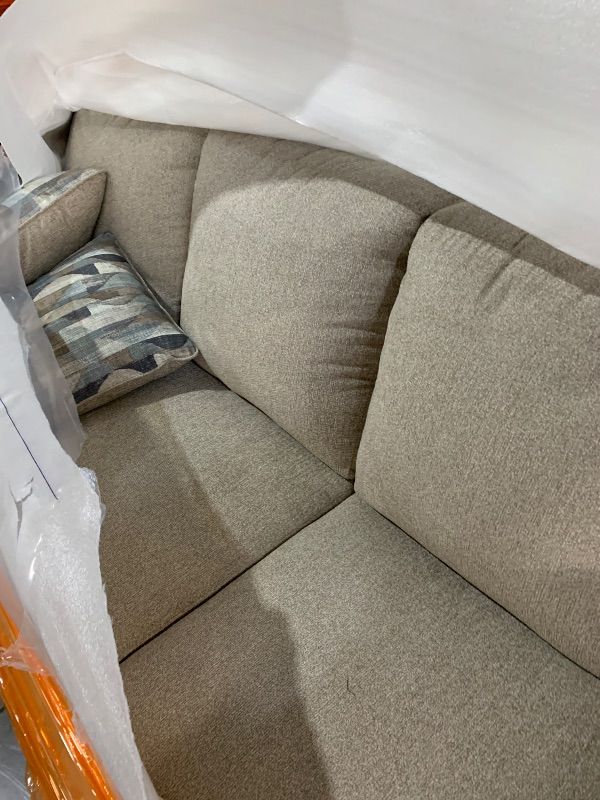 Photo 1 of ****PALLET TRUCK OR TRAILER PICK UP ONLY************Signature Design by Ashley Deltona Contemporary Sofa with 2 Accent Pillows, Beige