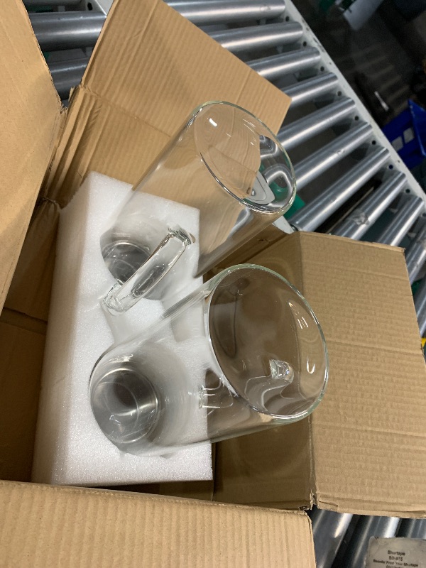 Photo 1 of ***(MINOR DAMAGE/ SEE NOTES)***
2 Pack 1.2 Liter 40 oz Small Glass Pitcher with Lid and Spout, Glass Carafe Water Pitcher for Hot/Cold Water, Iced Tea, Drinks, Coffee, Juice and Homemade Beverage