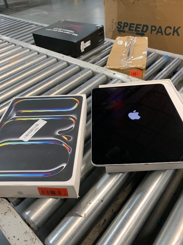 Photo 1 of **Prev used**Minor Damage**Powers on**
Apple iPad Pro 13-Inch (M4): Built for Apple Intelligence, Ultra Retina XDR Display, 512GB, 12MP Front/Back Camera, LiDAR Scanner, Wi-Fi 6E + 5G Cellular, Face ID, All-Day Battery Life — Silver