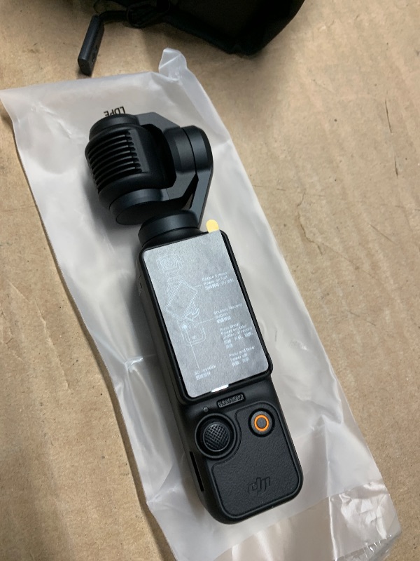 Photo 1 of DJI Osmo Pocket 3 Creator Combo, Vlogging Camera with 1'' CMOS, 4K/120fps Video, 3-Axis Stabilization, Face/Object Tracking, Fast Focusing, Mic Included for Clear Sound, Digital Camera for Photography