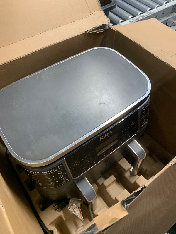 Photo 1 of (HEAVILY USED) (PARTS/SCRAP) Ninja DZ201 Foodi 8 Quart 6-in-1 DualZone 2-Basket Air Fryer with 2 Independent Frying Baskets, Match Cook & Smart Finish to Roast, Broil, Dehydrate & More for Quick, Easy Meals, Grey