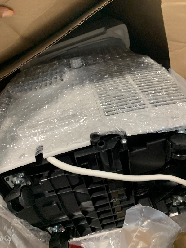 Photo 1 of Amazon Basics Portable Air Conditioner with Remote, Easy Installation, AC Unit for Bedrooms, Cools 450 Sq Ft, 10,000 BTU ASHARE / 6000 BTU SACC, White