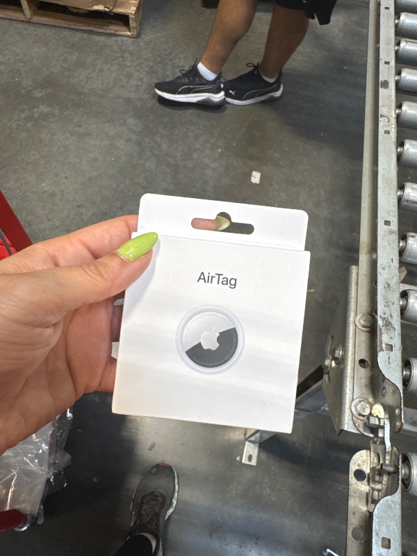 Photo 1 of **LOCKED** Apple AirTag
