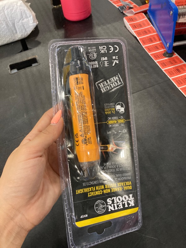 Photo 1 of Klein Tools NCVT3P Dual Range Non Contact Voltage Tester, 12 - 1000V AC Pen, Flashlight, Audible and Flashing LED Alarms, Pocket Clip
