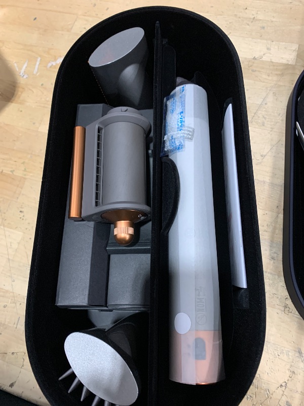 Photo 1 of *powers on**Dyson Airwrap™ Multi-Styler Complete Long, Nickel/Copper