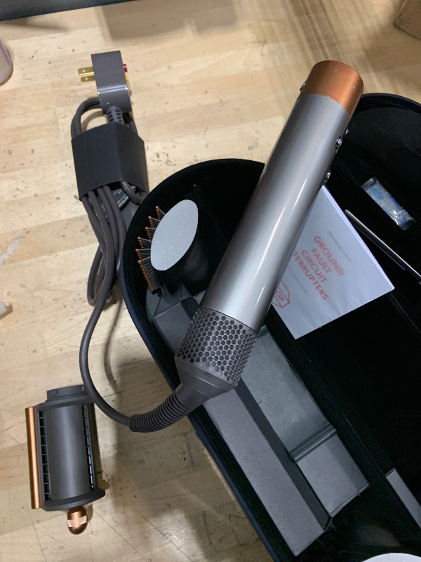 Photo 1 of *powers on**Dyson Airwrap™ Multi-Styler Complete Long, Nickel/Copper