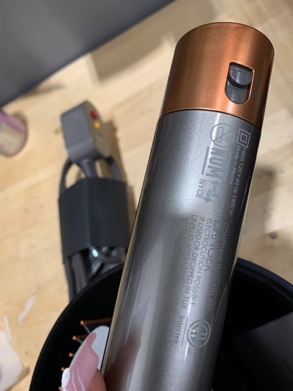 Photo 1 of *powers on**Dyson Airwrap™ Multi-Styler Complete Long, Nickel/Copper
