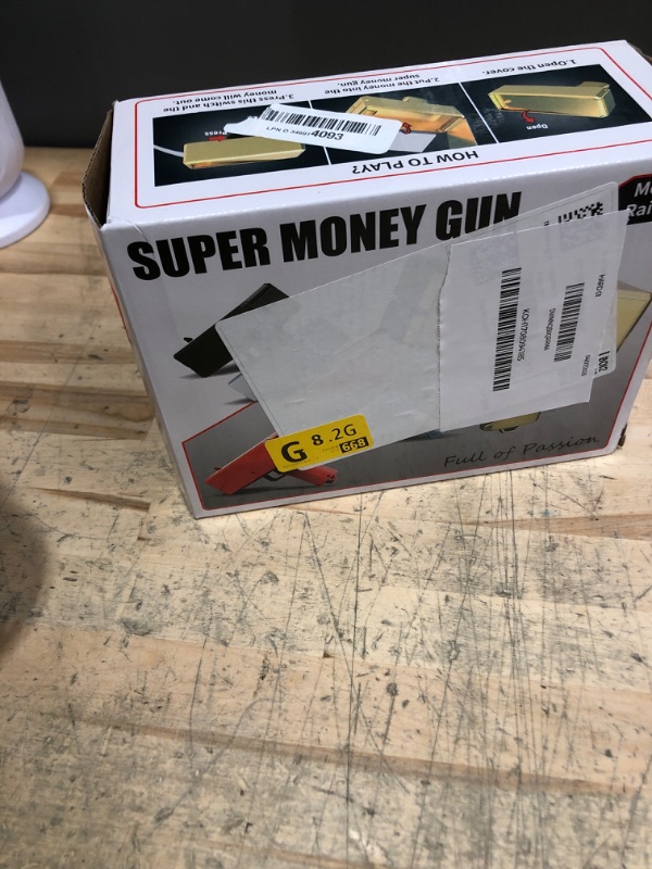 Photo 1 of Alagoo Super Money Guns Paper Playing Spary Gun Make it Rain Toy Gun, Handheld Cash Fake Bill Dispenser Shooter Toy(Metallic Gold)