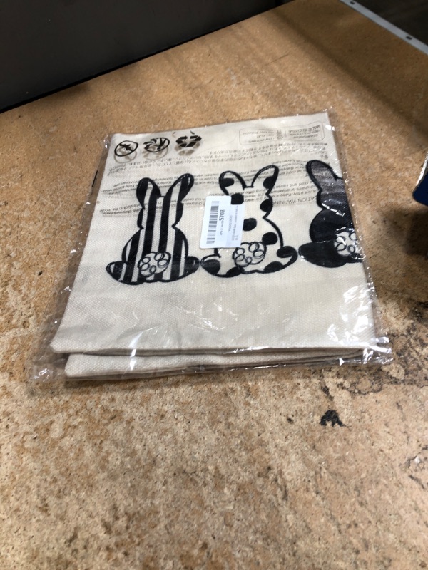 Photo 1 of AVOIN colorlife Easter Rabbits Throw Pillow Cover, 12 x 20 Inch Black and White Spring Holiday Party Cushion Case Decoration for Sofa Couch