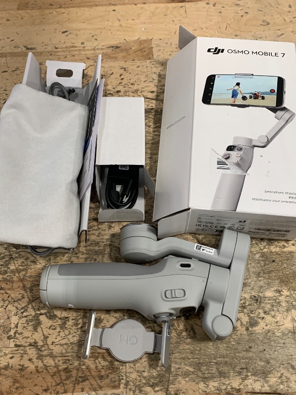 Photo 1 of DJI Osmo Mobile 7 Gimbal Stabilizer for iPhone, Android, Built-in Tripod, Ultra-Light, Comfortable Grip, 3-Axis Phone Gimbal, ActiveTrack 7.0, ShotGuides, One-Tap Edit, 10hrs Use, Phone Charging