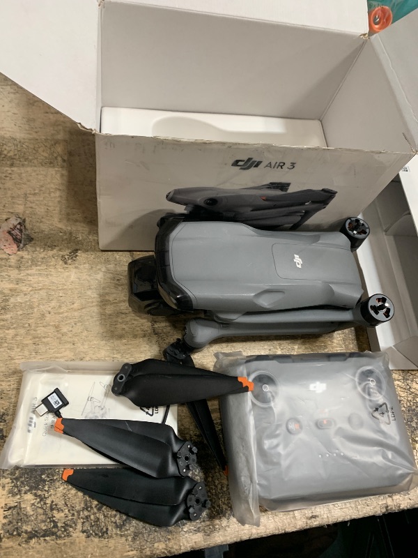 Photo 1 of ** MISSING PARTS FINAL SALE PARTS ONLY.** DJI Air 3 (DJI RC-N2), Drone with Medium Tele & Wide-Angle Dual Primary Cameras, 46-Min Max Flight Time, Omnidirectional Obstacle Sensing, 48MP Photos, 4K/60fps HDR, Compliance with FAA Remote ID