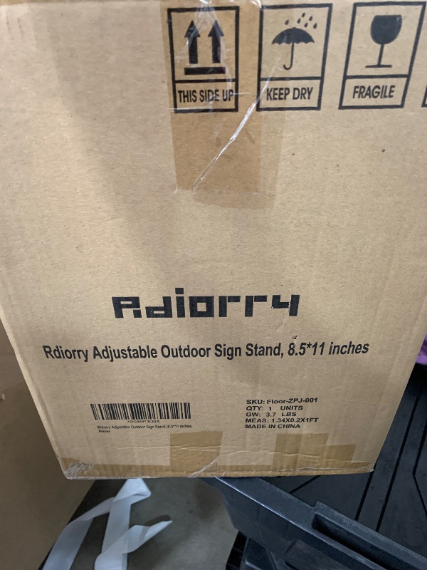 Photo 1 of Rdiorry Adjustable Sign Stand, 8.5x11 Inches Floor Standing Sign Holder Stand, Snap-On Open Frame, 360° Rotating Display Outdoor Advertising Poster Signage Stand?Black?