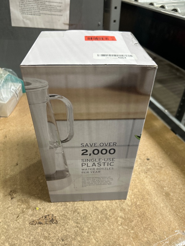 Photo 1 of LifeStraw Home– Water Filter Pitcher, 7-Cup, Glass with Silicone Base, Wisteria, for Everyday Protection Against Bacteria, parasites, microplastics, Lead, Mercury, PFAS and a Variety of Chemicals