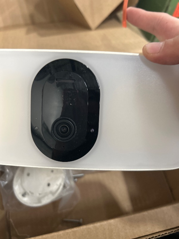 Photo 1 of Arlo Pro 3 Floodlight Wireless Camera, Color Night Vision, Motion Sensor, 2-Way Audio, White, 1-Pack (Renewed)