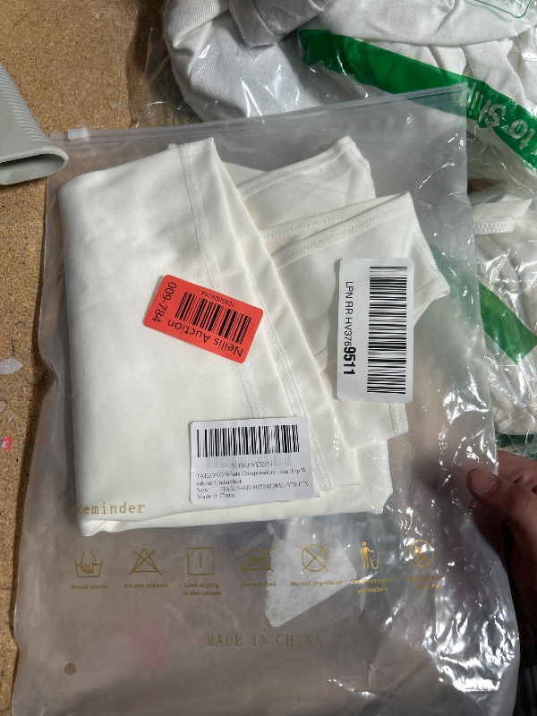 Photo 1 of ***(HEAVILY USED/ STAINED)***
TAILONG White Compression Shirt Men Shapewear Slimming Body Shaper Vest Compression Tank Top Undershirt medium 