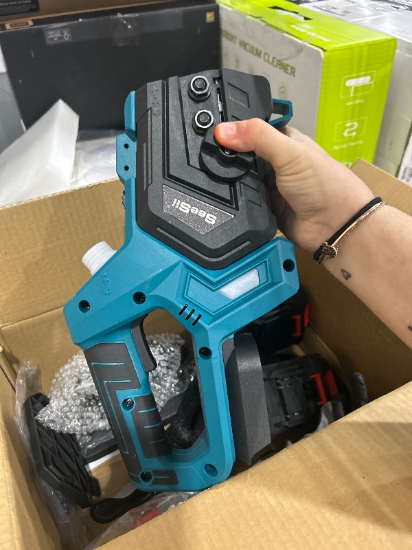 Photo 1 of Seesii Chainsaw Cordless 12-inch, Electric HandHeld Chain Saw, 12-in Portable Chainsaw Battery Powered Saws for Trees Wood Cutting, 2 * 4.0Ah Battery and Charger Included, CH1200+
