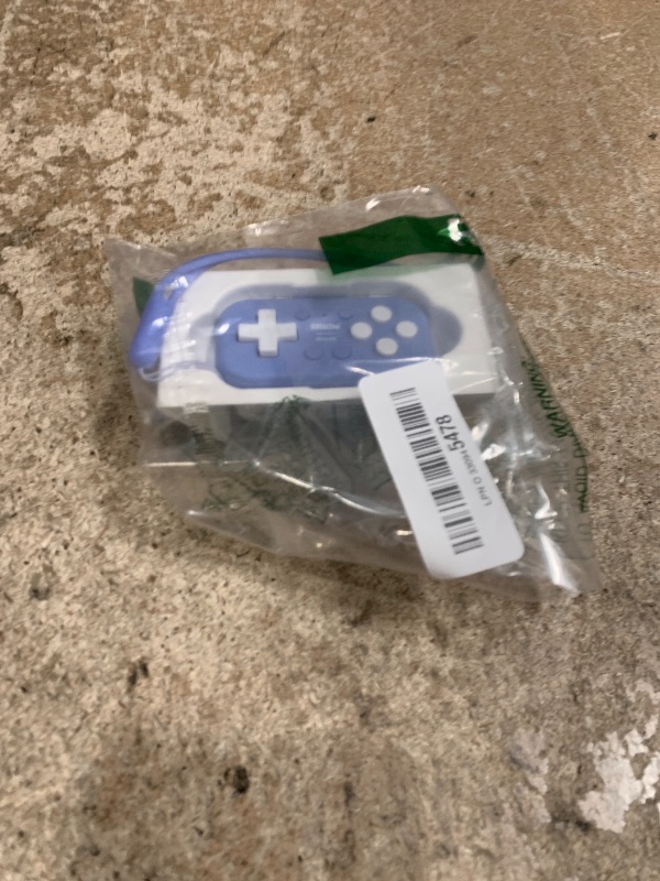 Photo 1 of 8Bitdo Micro Bluetooth Gamepad Pocket-sized Mini Controller for Switch, Android, and Raspberry Pi, Supports Keyboard Mode (Blue)