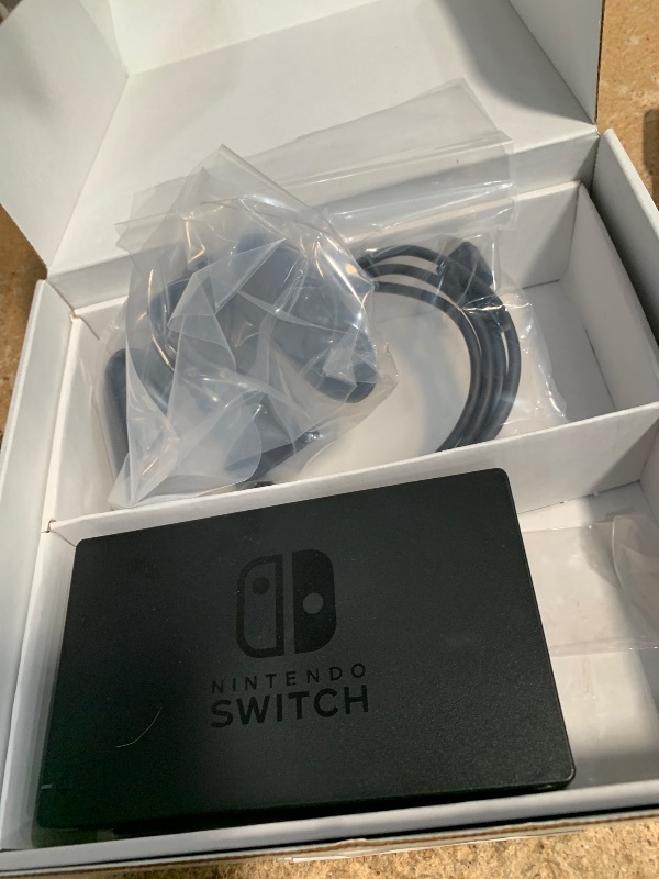 Photo 1 of *WONT POWER ON* Nintendo Switch with Neon Blue and Neon Red Joy?Con V2 (Renewed Premium).