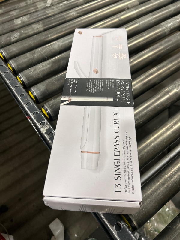 Photo 1 of T3 SinglePass Curl X Extra-Long Barrel Curling Iron with 9 Heat Settings and Ceramic Barrel for Fast Styling and Lasting Results on All Hair Types