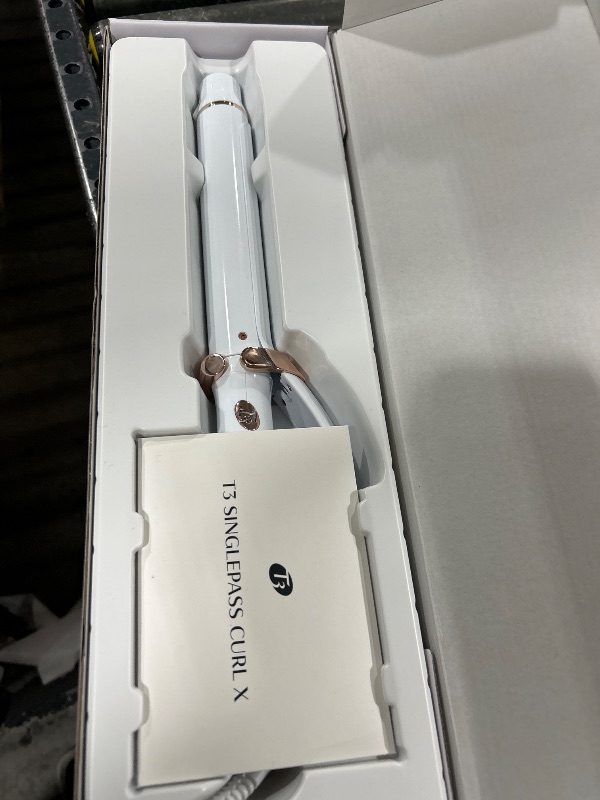 Photo 1 of T3 SinglePass Curl X Extra-Long Barrel Curling Iron with 9 Heat Settings and Ceramic Barrel for Fast Styling and Lasting Results on All Hair Types
