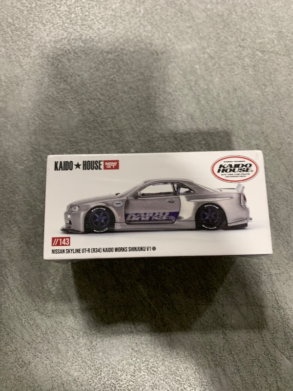 Photo 1 of Diecast Collectible Model Car Compatible with Kaido House x Mini GT 1:64 Nissan Skyline GT-R (R34) Kaido Works Shinjuku V1 Limited Edition Die-Cast KHMG143