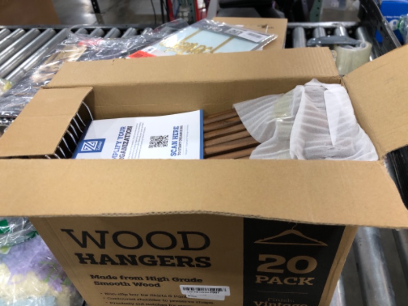 Photo 1 of ZOBER Wooden Hangers - 20 Pack, Heavy Duty, Non Slip Wood Hangers for Coats,Suits, Jackets, & Pants - Clothes Hangers for Closet W/Bar and Notches