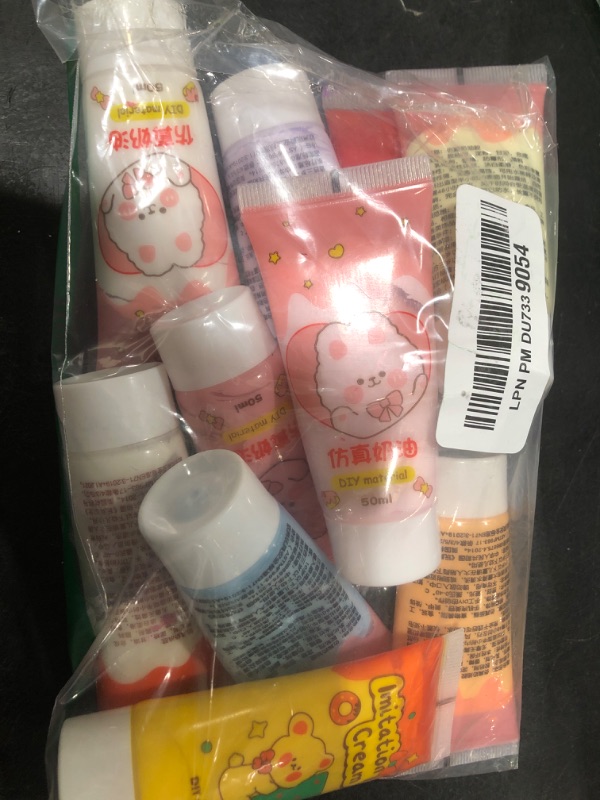Photo 1 of Lineshading 12 Pcs 50ml Whipped Cream Glue DIY Kit Phone Case Kit Include Simulation Fake Whipped Cream Glue with Nozzle Candy Theme Decorations Decorating Accessories for DIY Craft Gift(Candy)