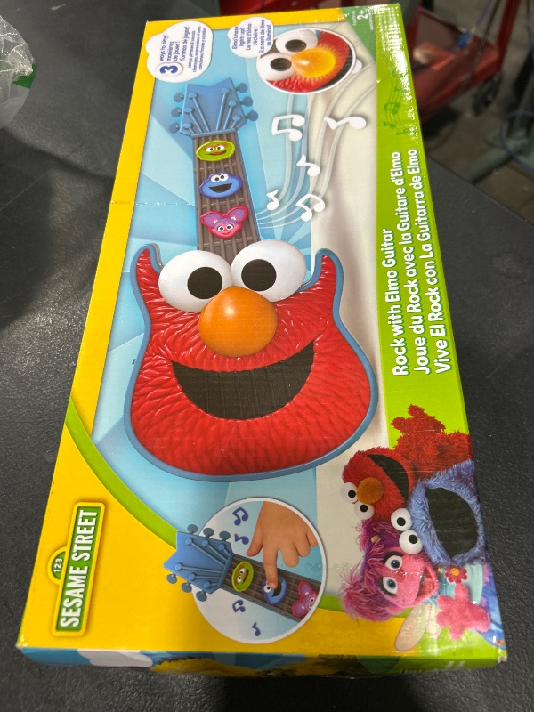 Photo 1 of Sesame Street Rock with Elmo Guitar, Dress Up and Pretend Play, Lights and Sounds Preschool Musical Toy, Kids Toys for Ages 2 Up by Just Play