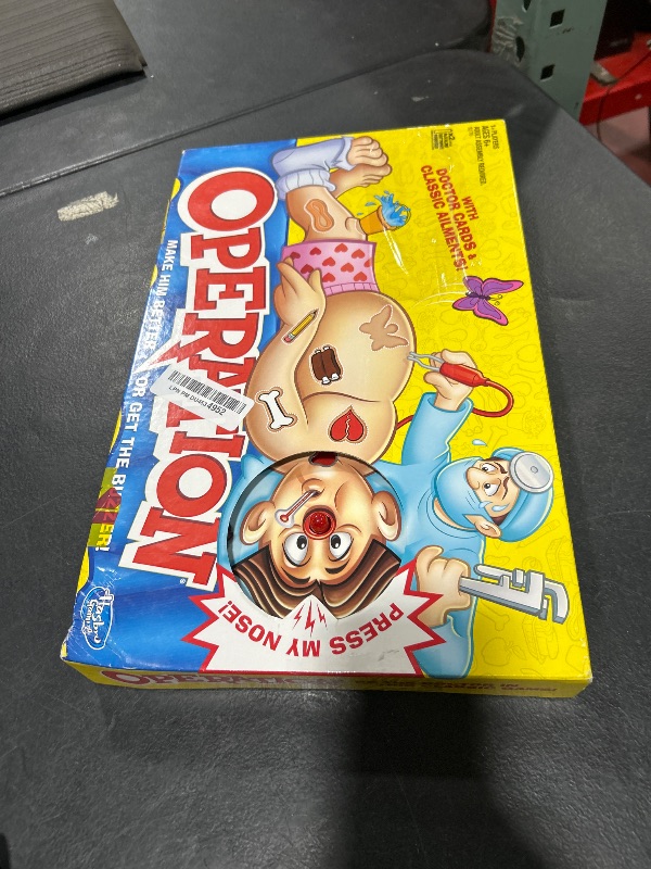 Photo 1 of Hasbro Gaming Operation Electronic Board Game with Doctor Cards and Funny Ailments, Kids Games, 1+ Players, Funny Board Game for Children Ages 6+ (Amazon Exclusive)