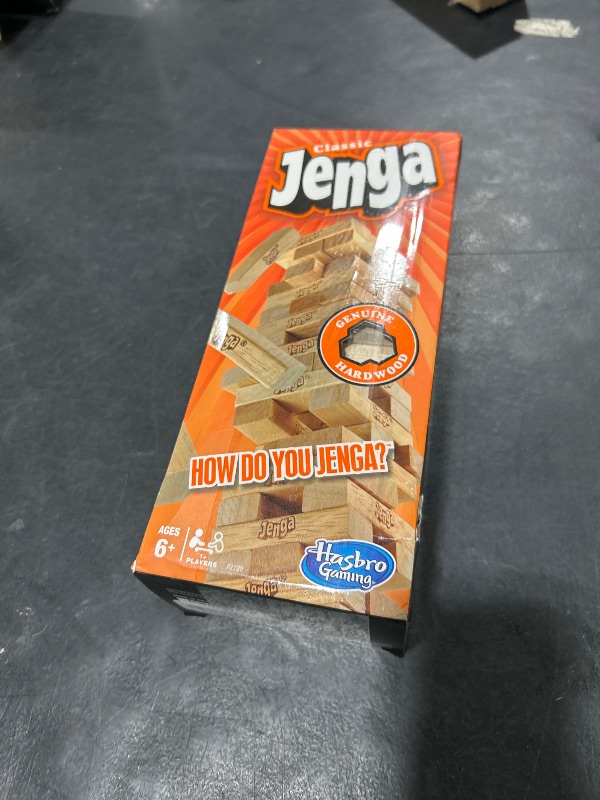 Photo 1 of Jenga Game | The Original Wood Block Game with Genuine Hardwood Blocks | Stacking Tower Game | Ages 6+ | 1 or More Players | Party Games for Kids | Family Games