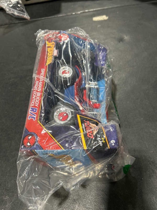 Photo 1 of Jada Spider-Man Buggy RC with Non-Removable Spider-Man Figure – 7", Turbo Button, Full-Function Remote Control, Ages 6+, Red/Blue