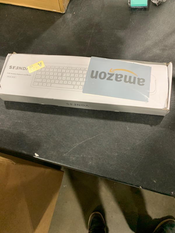 Photo 1 of Wireless Keyboard and Mouse Combo - Full Size Slim Thin Wireless Keyboard Mouse with Numeric Keypad 2.4G Stable Connection Adjustable DPI (White & Silver)