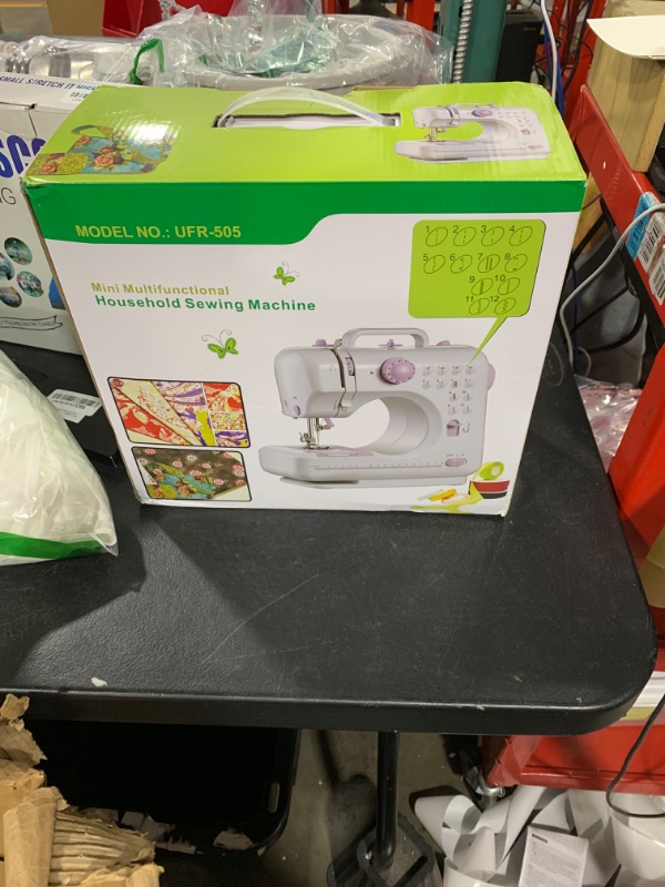 Photo 1 of Mini Sewing Machine for Beginner by Phildim - Small Electric Sewing Machines with 2 Speed 12 Built-in Stitch Patterns PD-054-A7